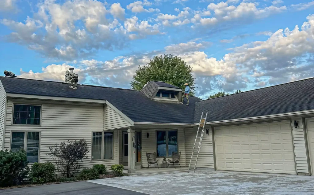 1980 Workers On Top Of Roofl Shaped House Roof Lg Copy